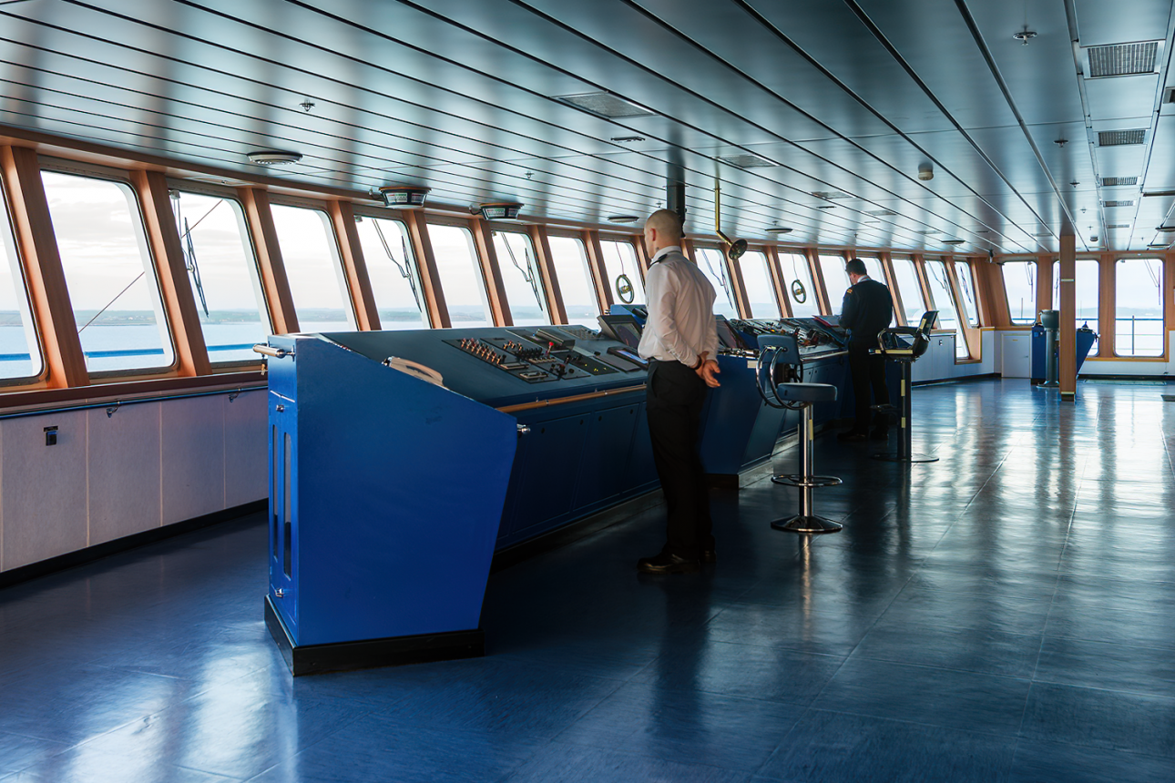 The crew on watch on the bridge of a ship.